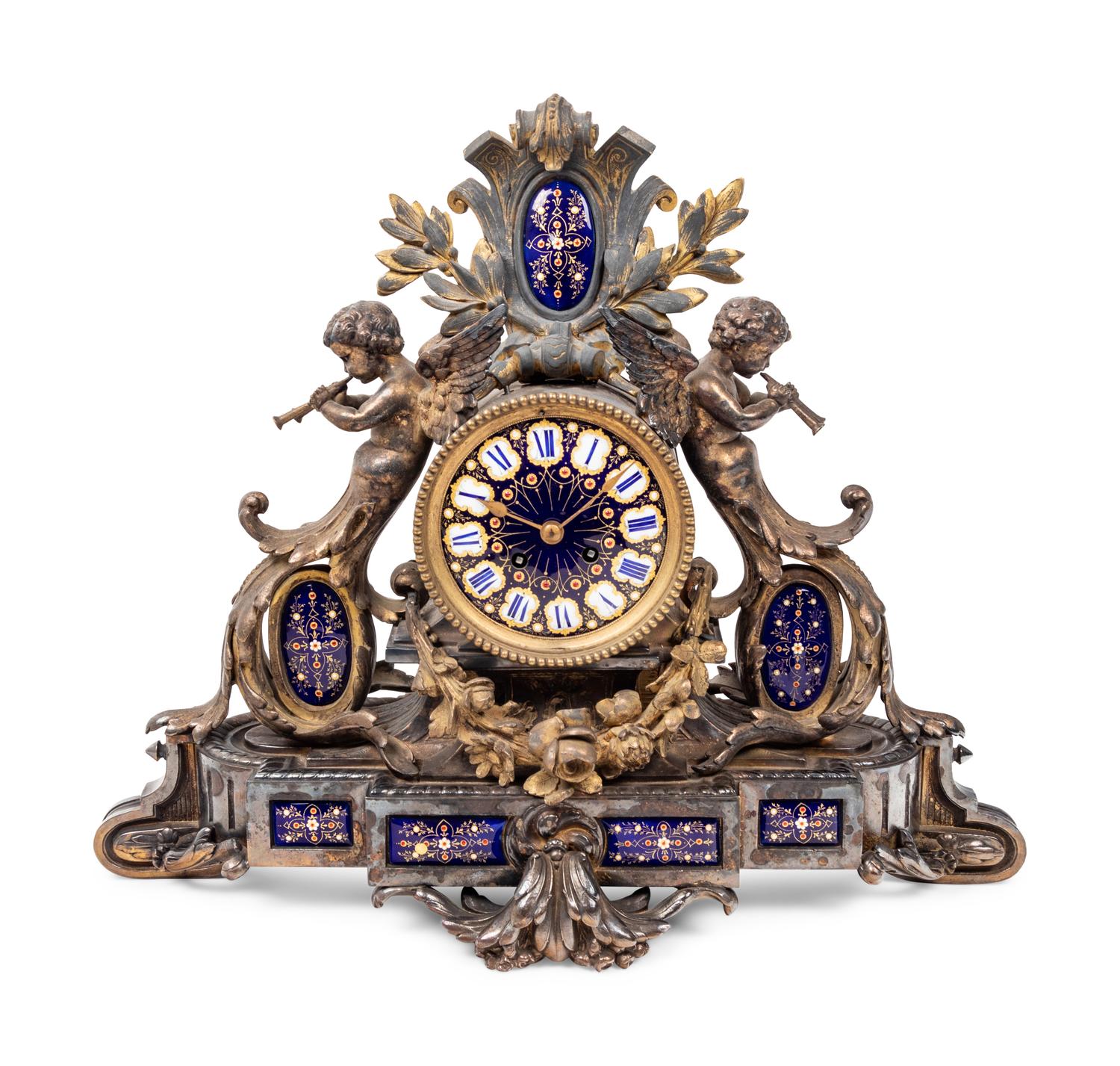 A Napoleon III Gilt Bronze and Enamel Clock Garniture
