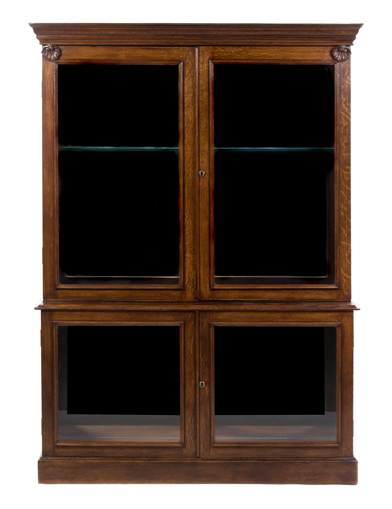 A Victorian Oak Vitrine, Height 79 x width 54 1/2 x depth 12 1/4 inches.