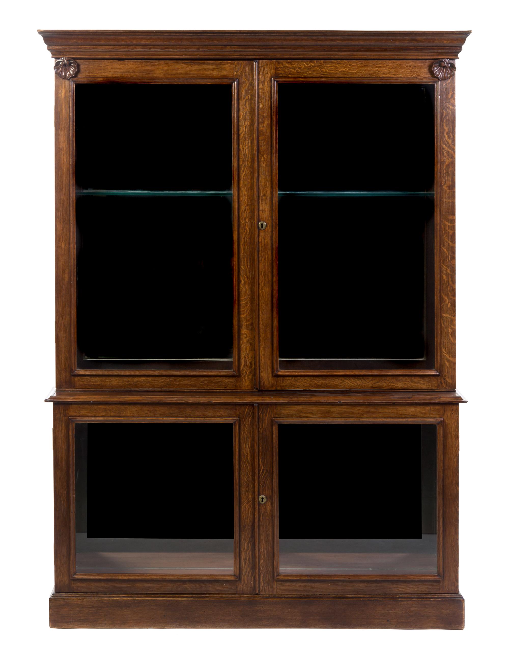 A Victorian Oak Vitrine, Height 79 x width 54 1/2 x depth 12 1/4 inches.