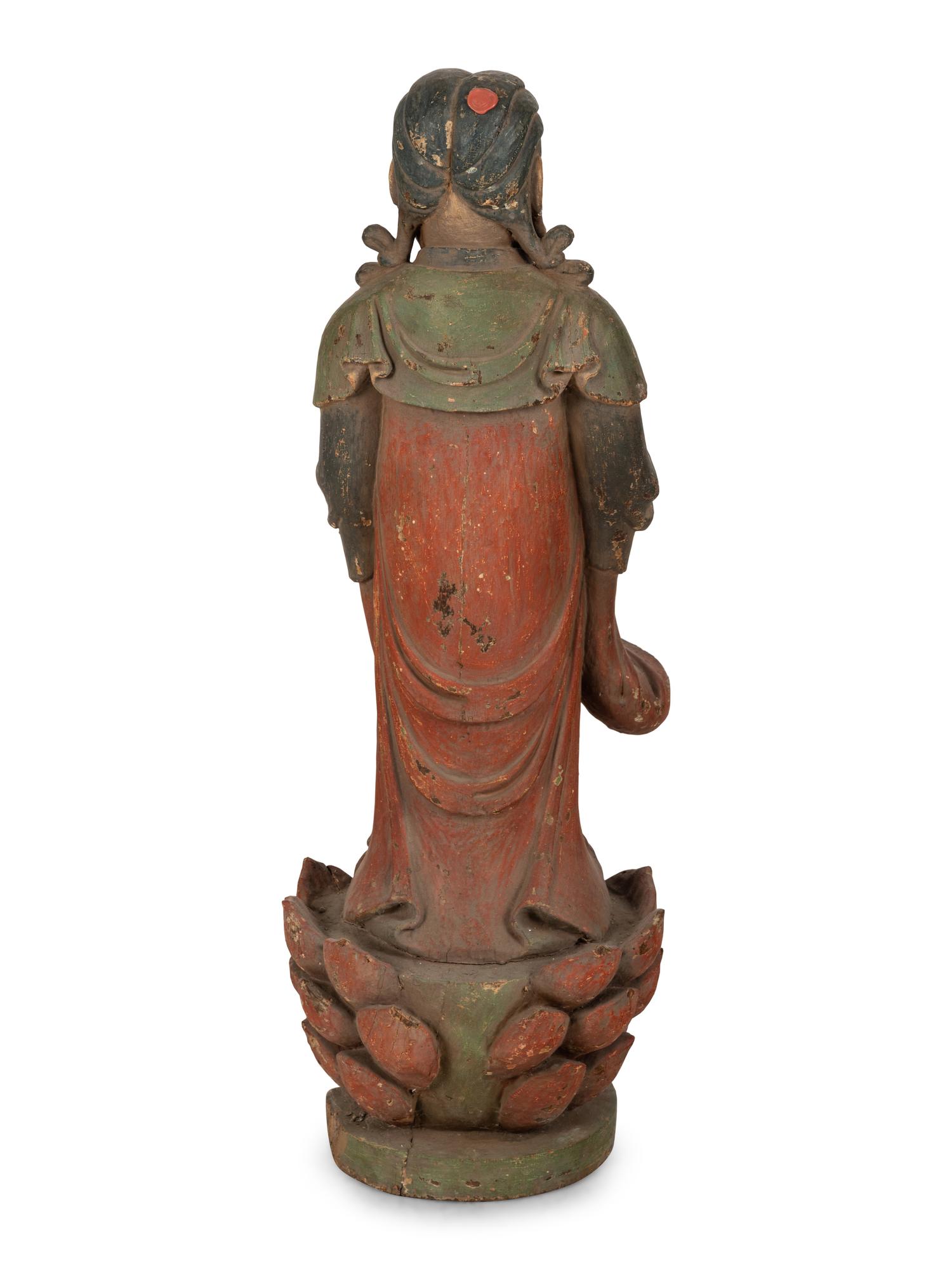 A Chinese Carved Wood Standing Figure with Polychrome Decoration