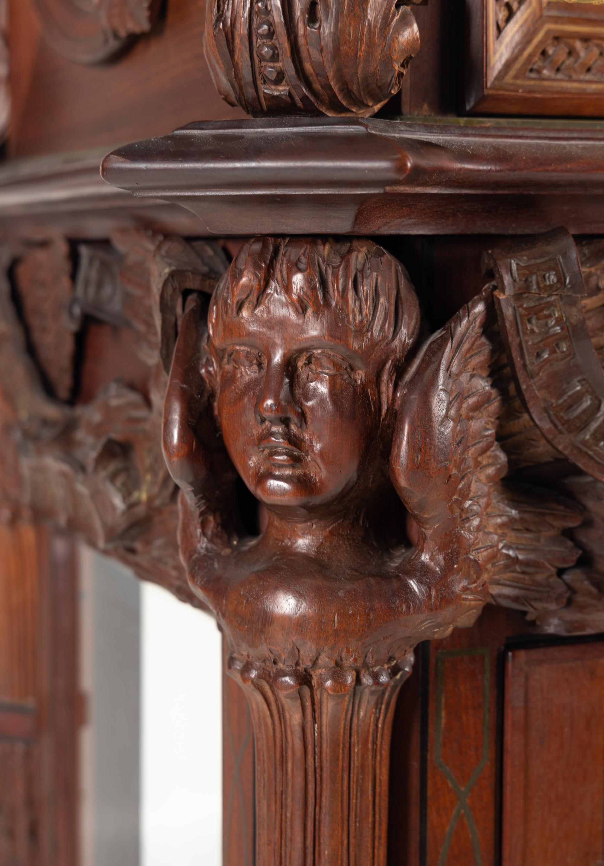 A Renaissance Revival Carved Mahogany Tube-Striking Tall Case Clock