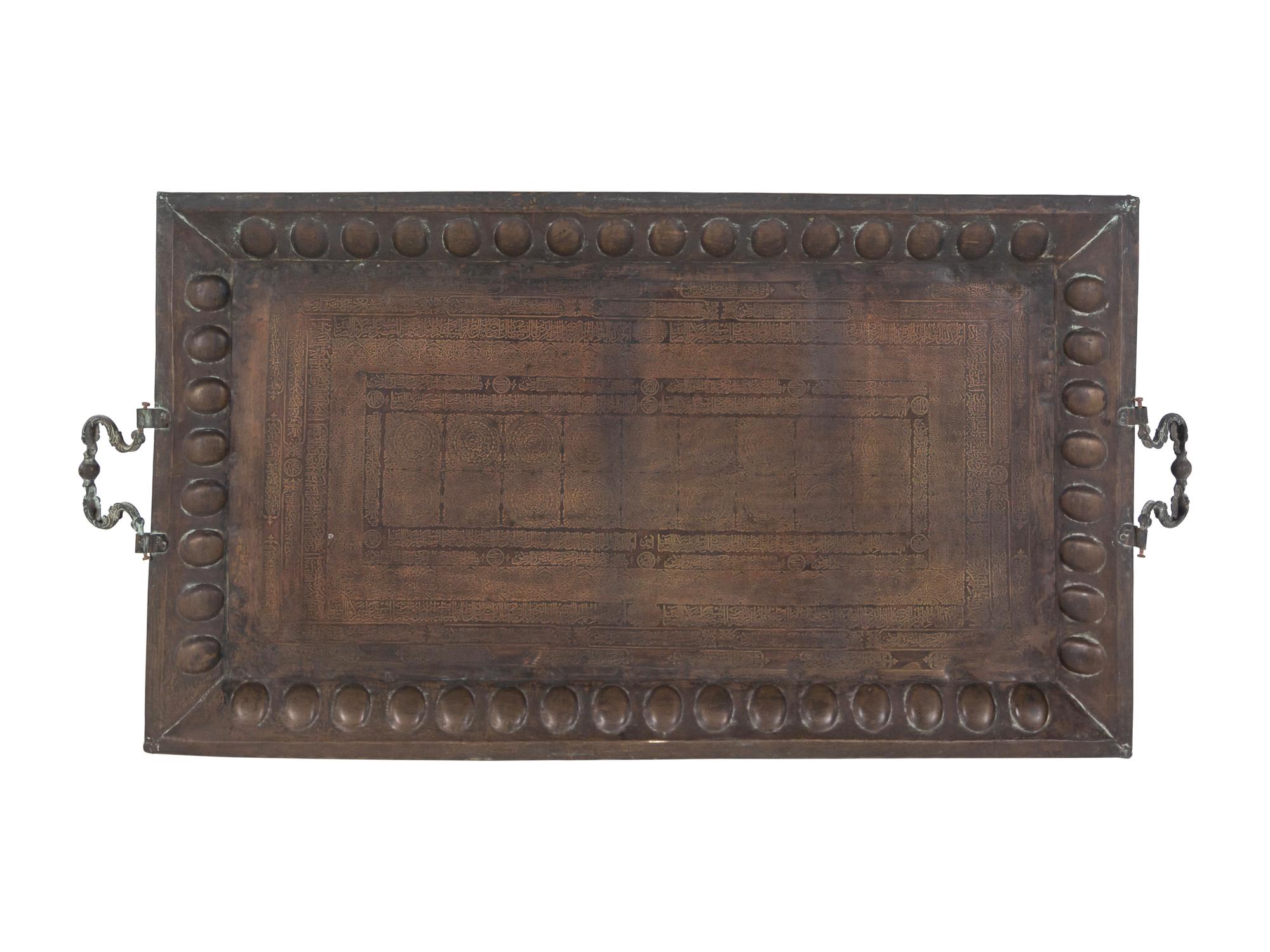 A Large Middle Eastern Damascened Brass Tray