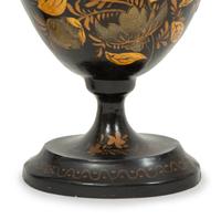 A Pair of Regency Style Black and Gilt Decorated Tole Covered Urns