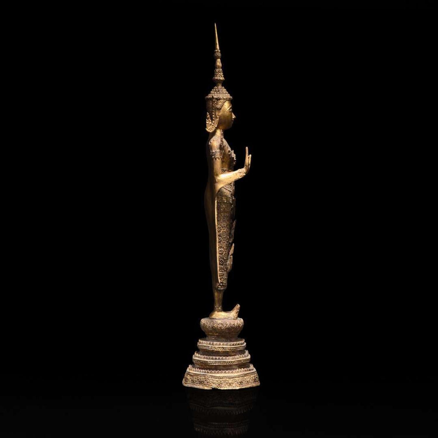 A Thai gilt lacquered bronze standing Buddha 泰国漆金佛造像立像