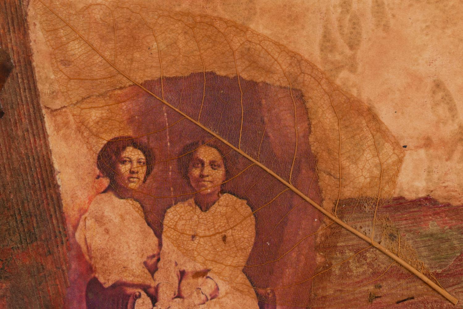 Two Women with Leaf