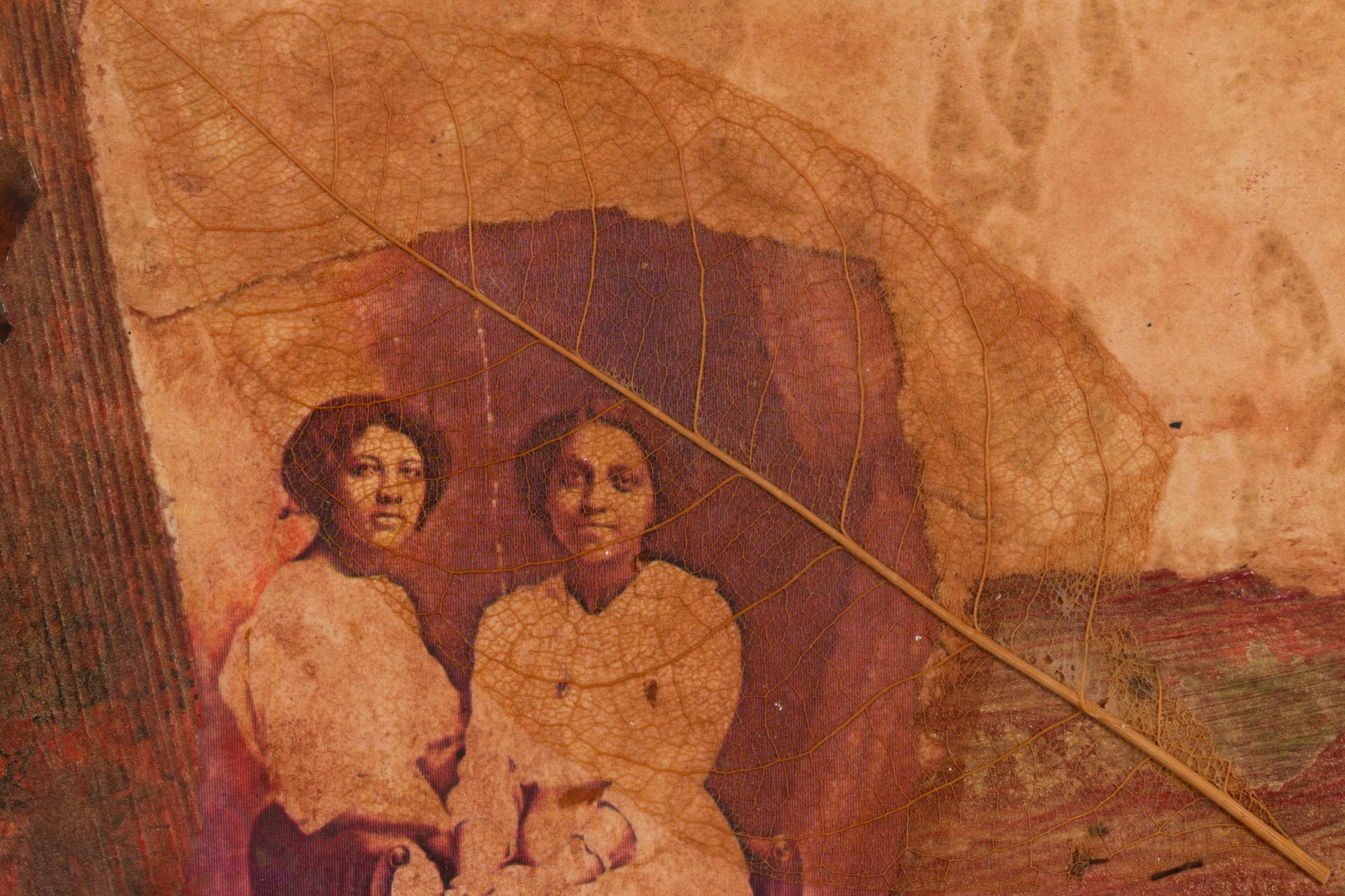Two Women with Leaf