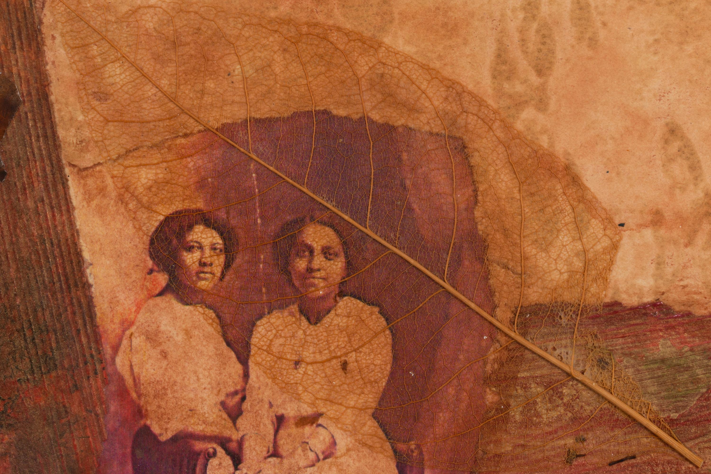 Two Women with Leaf