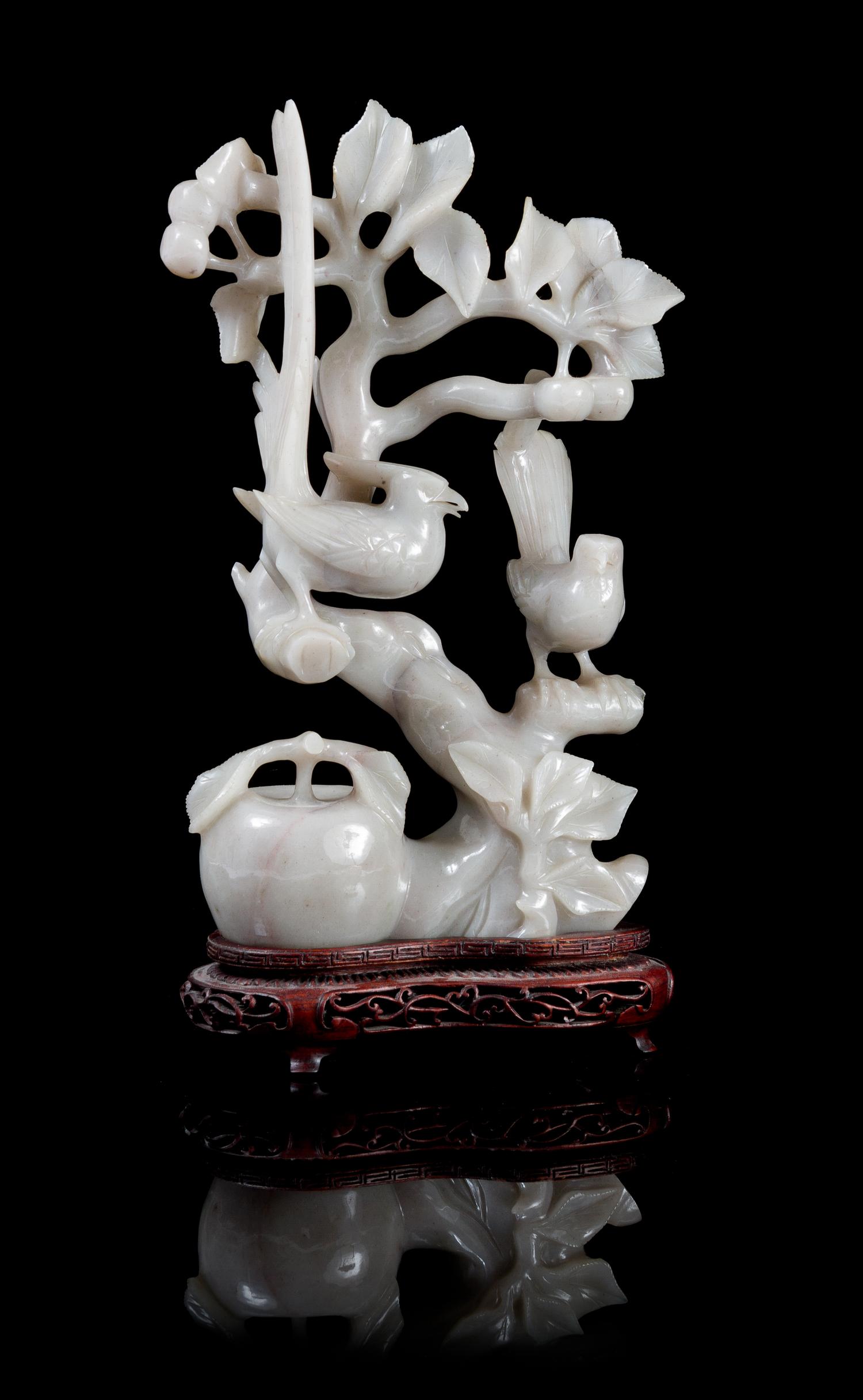 A Jade Carving Height excluding base 10 1/2 inches.