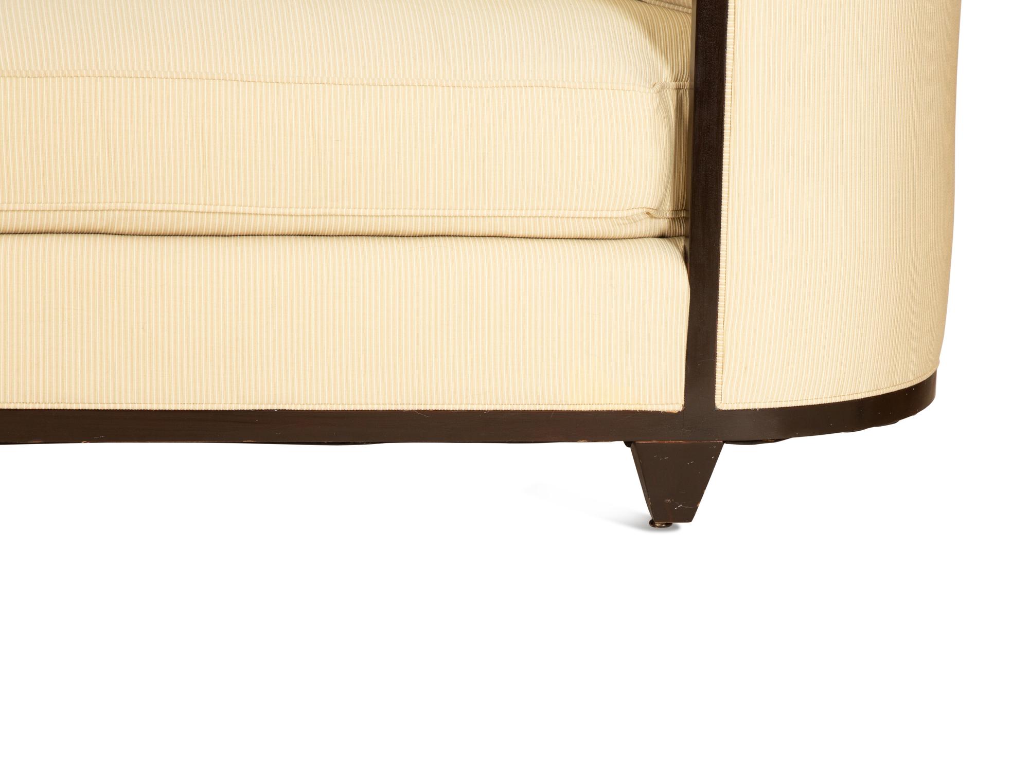 An Art Deco Style Upholstered Sofa — 20TH/21ST CENTURY