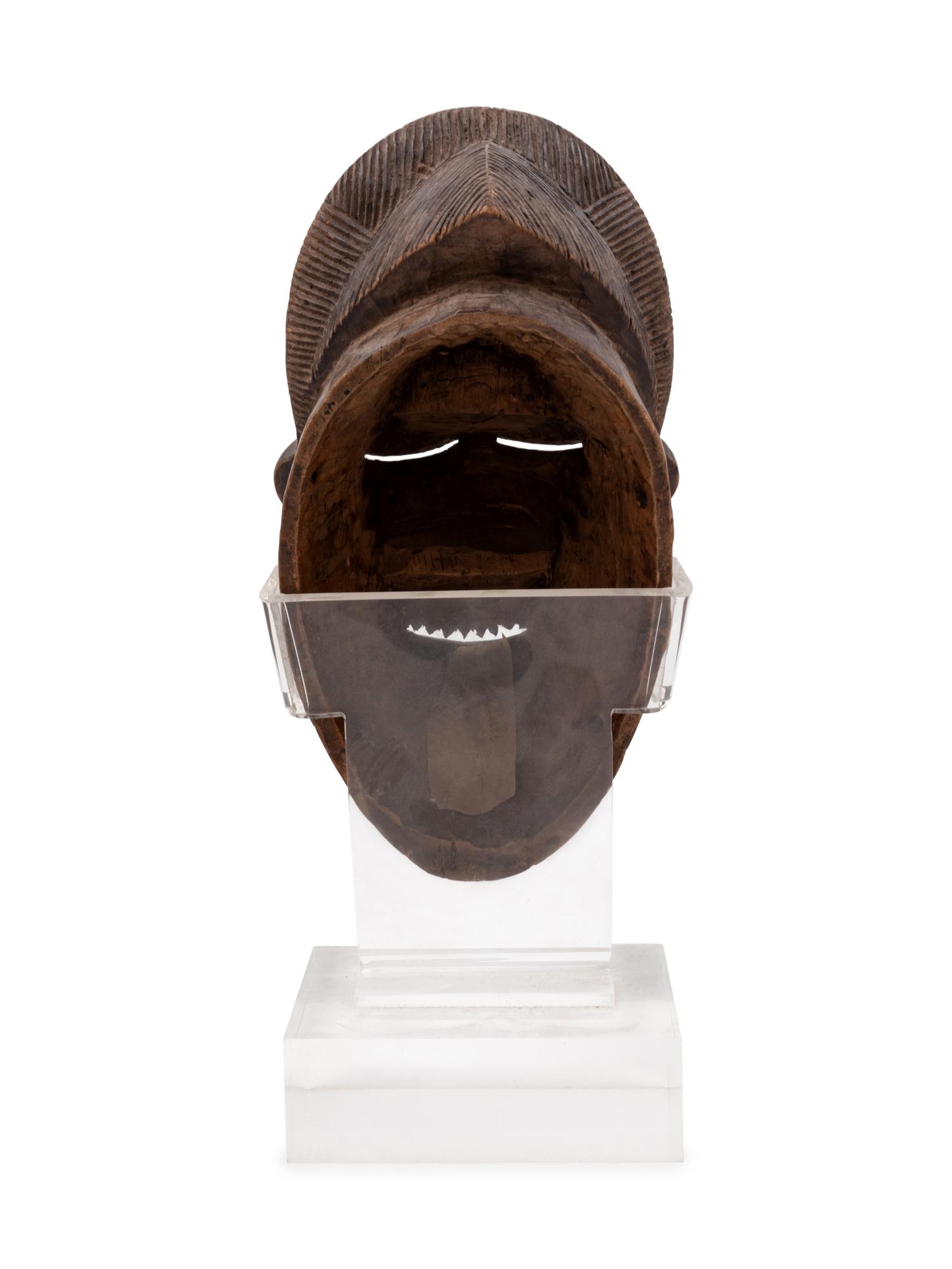 A Baule Style Carved Wood Mask