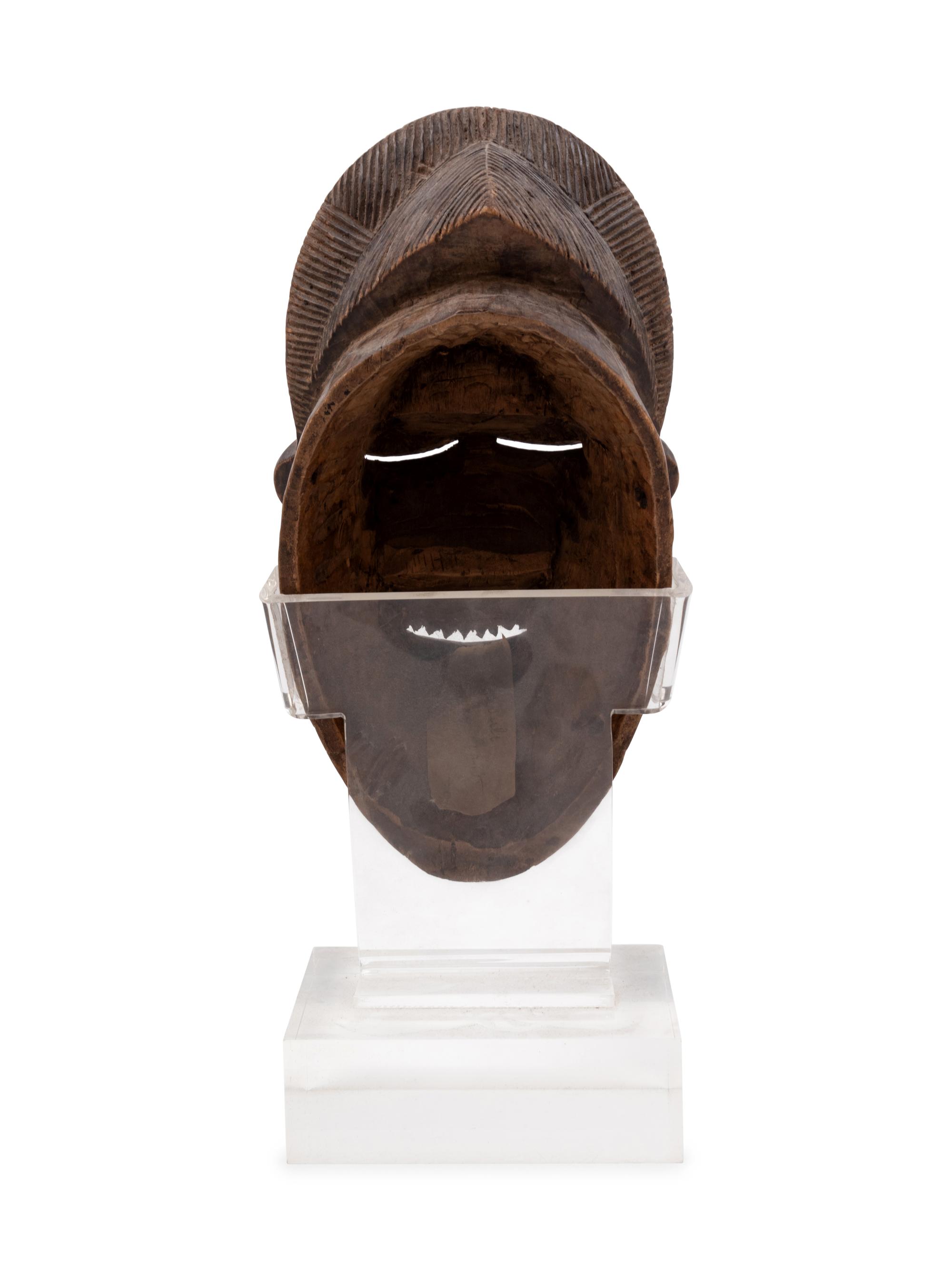 A Baule Style Carved Wood Mask