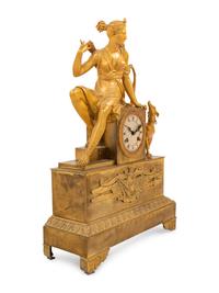 An Empire Style Gilt Bronze Figural Mantel Clock
