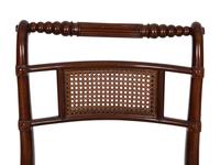 A Set of Four Regency Style Mahogany Cane Seat Dining Chairs
