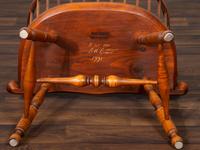 A D.R. Dimes Benchmark Turned and Volute Carved Tiger Maple and Pine Comb-Back Windsor Armchair