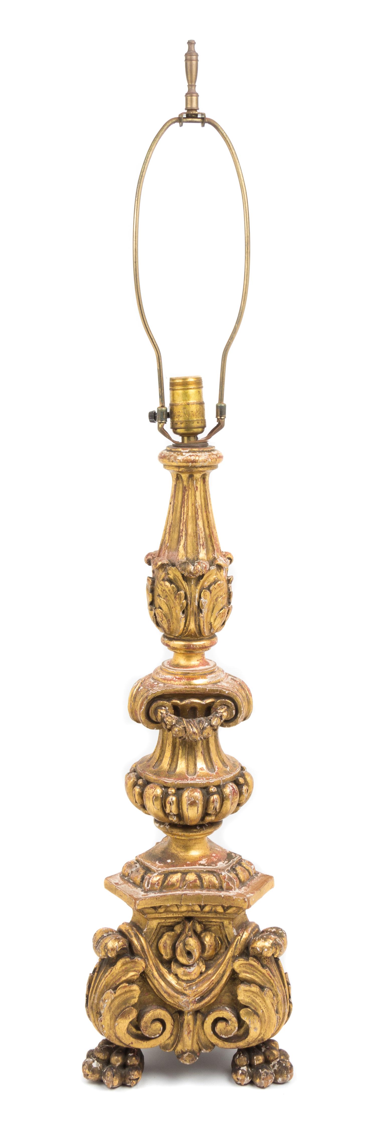 A Neoclassical Style Carved Giltwood Pricket Height 39 3/8 inches.