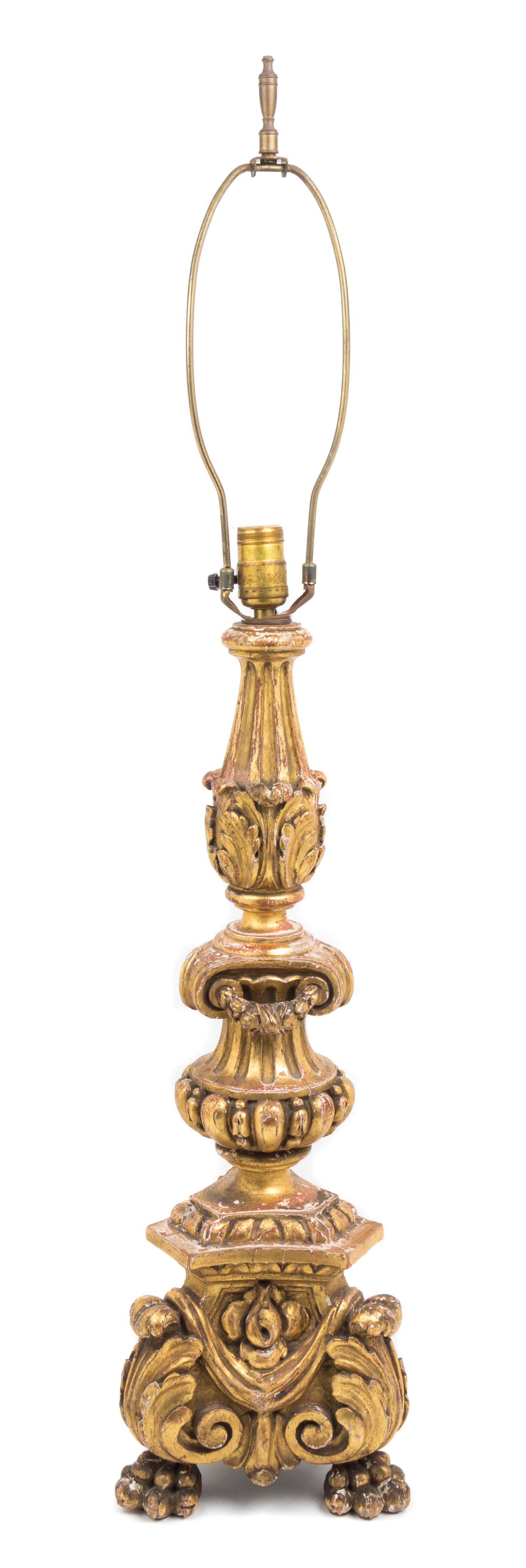 A Neoclassical Style Carved Giltwood Pricket Height 39 3/8 inches.