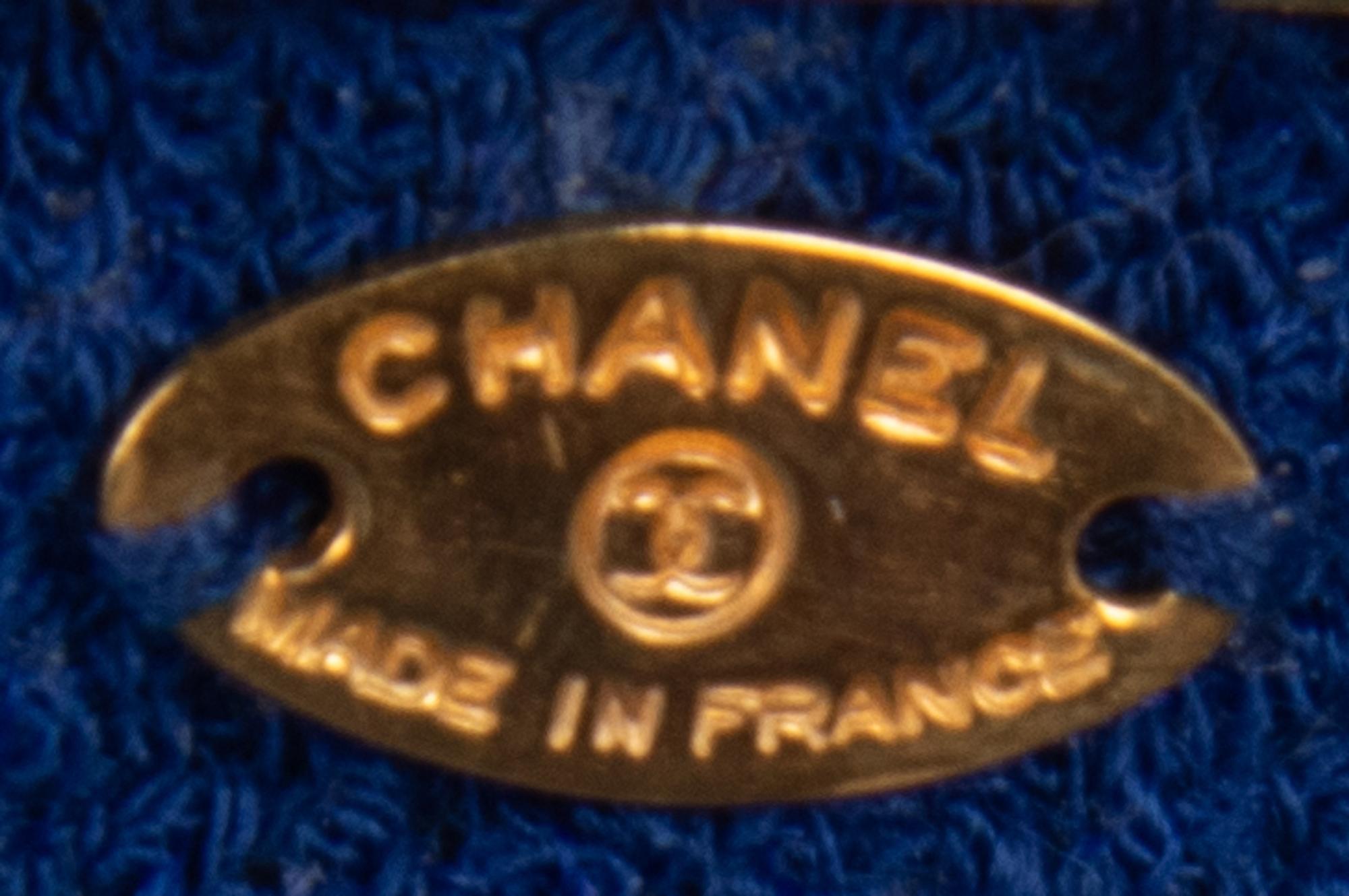 Six Chanel Camellia Brooches