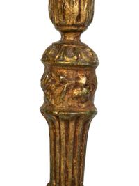 A Pair of Carved Giltwood Candlesticks
