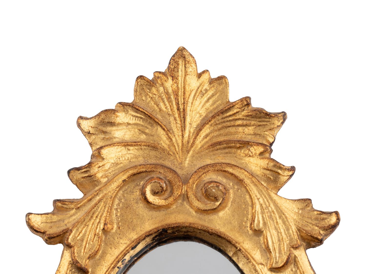 A Pair of Italian Gilt Composition Mirrors