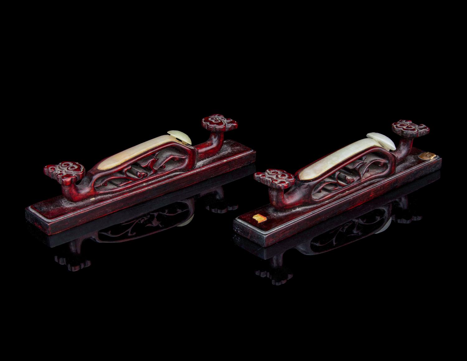 A Pair of Jade Inset Hardwood Paper Weights