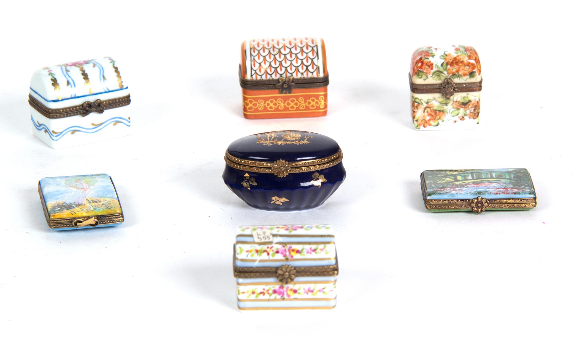 Seven Limoges Hand Painted Boxes Length of largest 2 1/2 inches.
