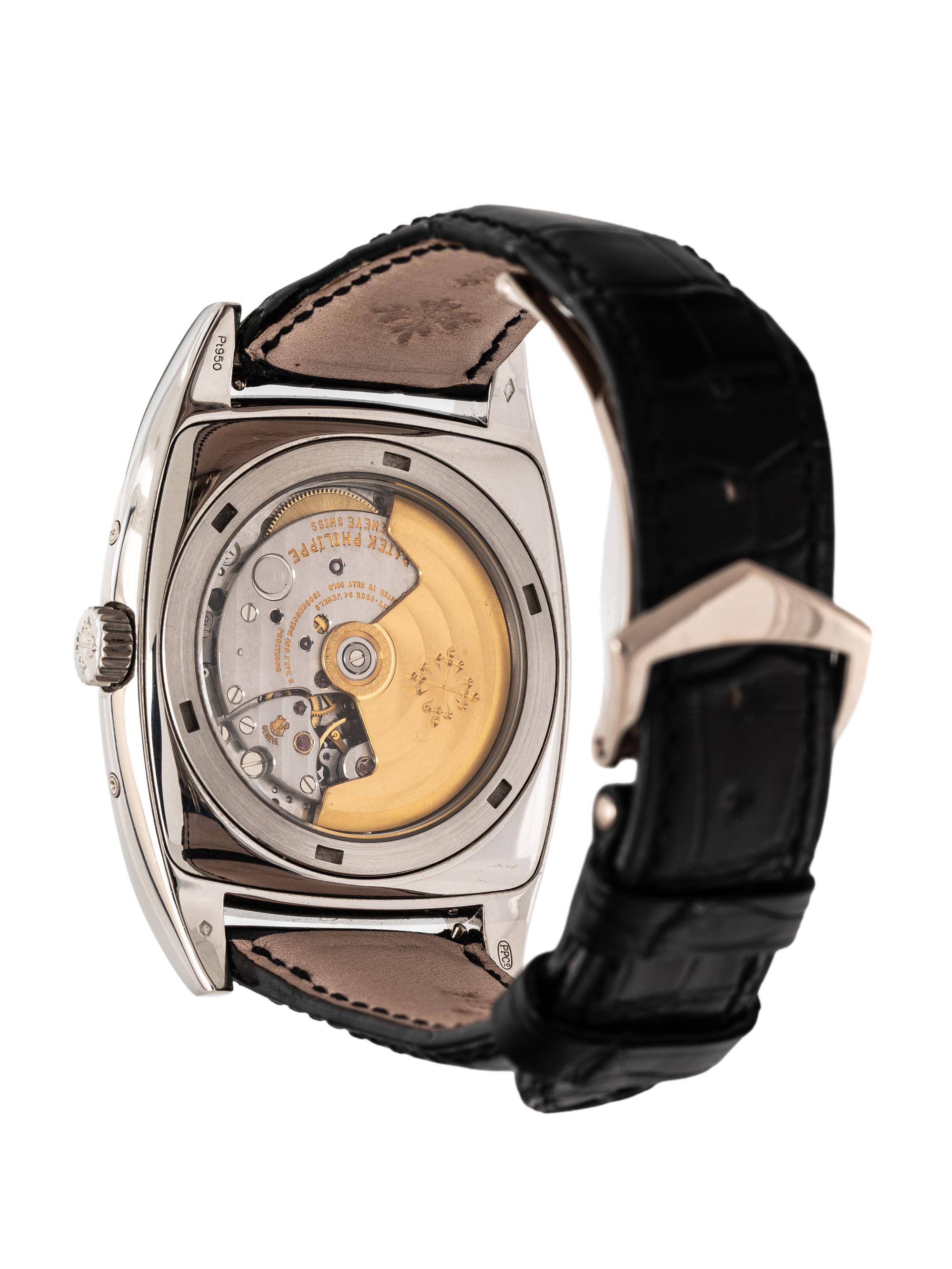 Patek Philippe, Ref. 5135P, Platinum Annual Calendar Moonphase Watch, with Box, Manuals, and Extract from the Archives