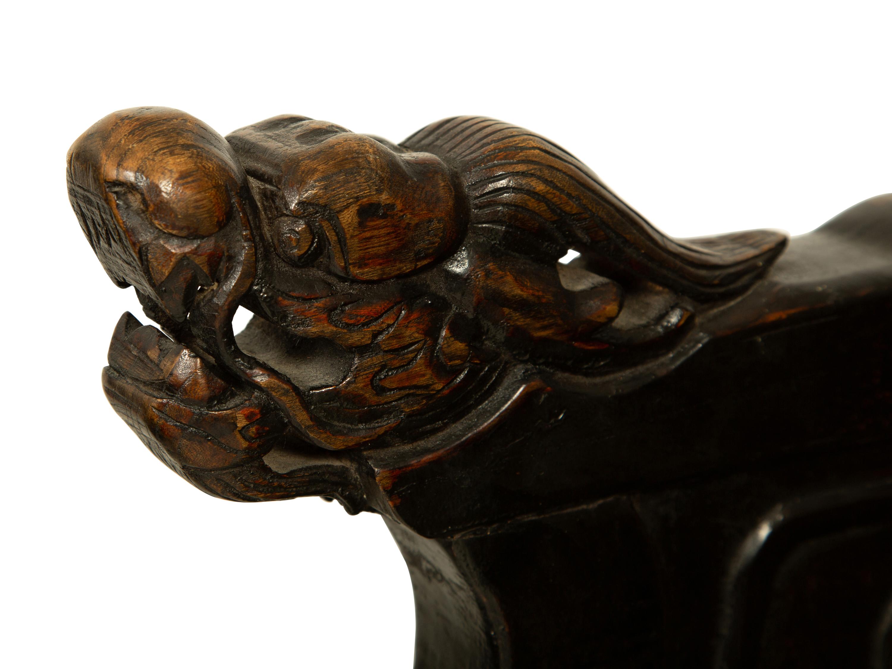 A Pair of Chinese Carved Hardwood Armchairs — 20TH CENTURY