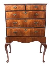 A George I Walnut Chest on Stand Height 55 3/4 x width 37 1/2 x depth 20 1/2 inches.