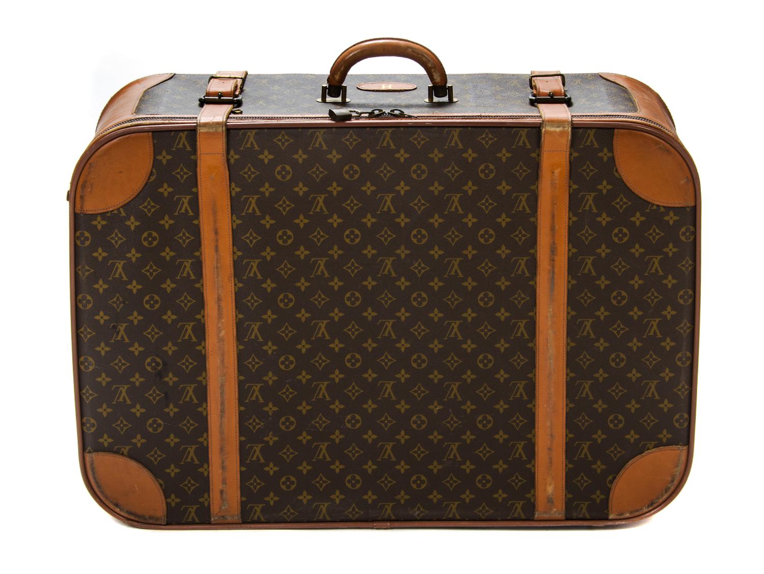A Louis Vuitton Monogram Canvas Soft-sided Suitcase and Folding Garment Bag, 29 1/2 x 20 x 9 inches.