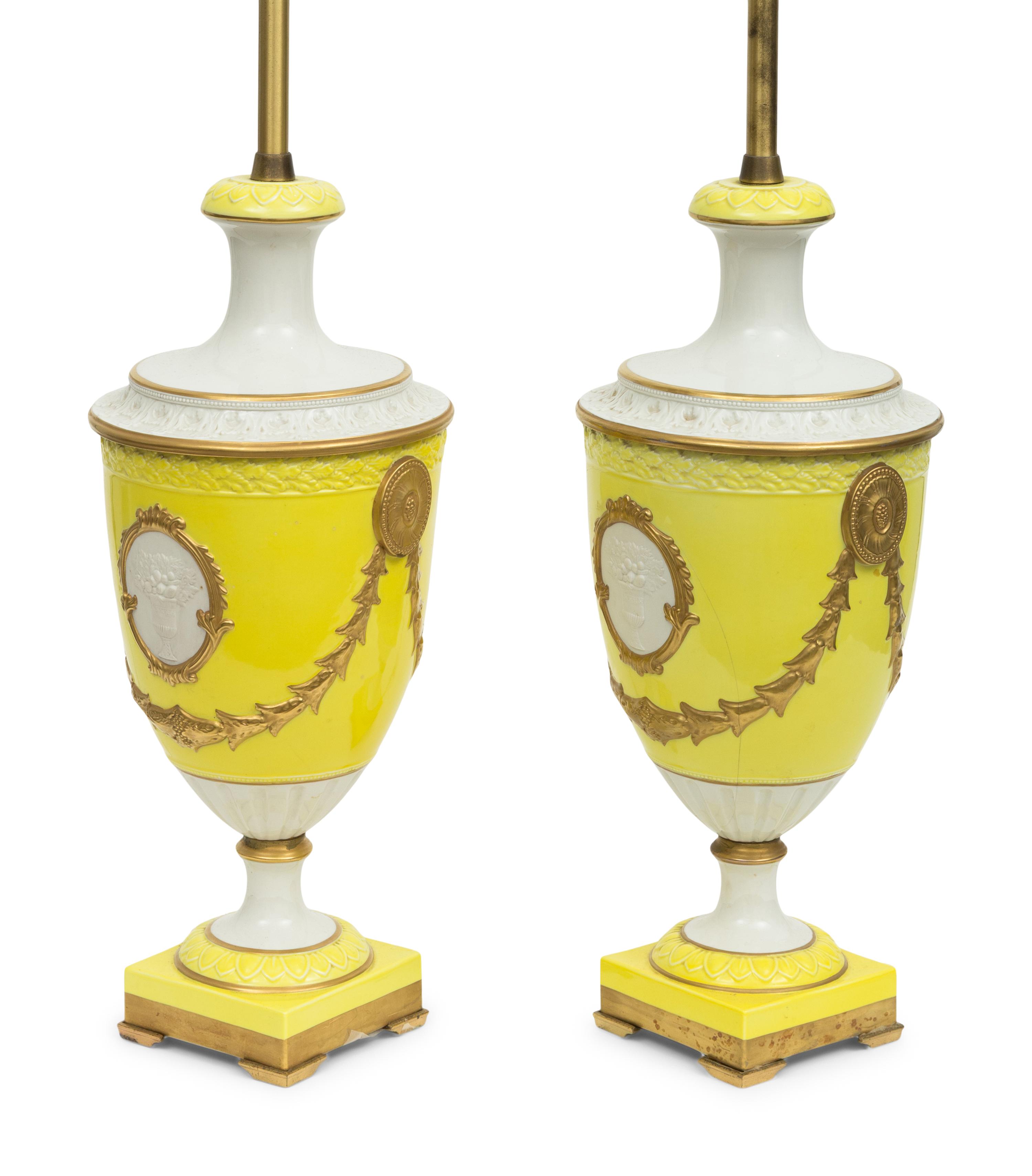 A Pair of Marbro Parcel Gilt Canary Yellow Urn-Form Porcelain Lamps