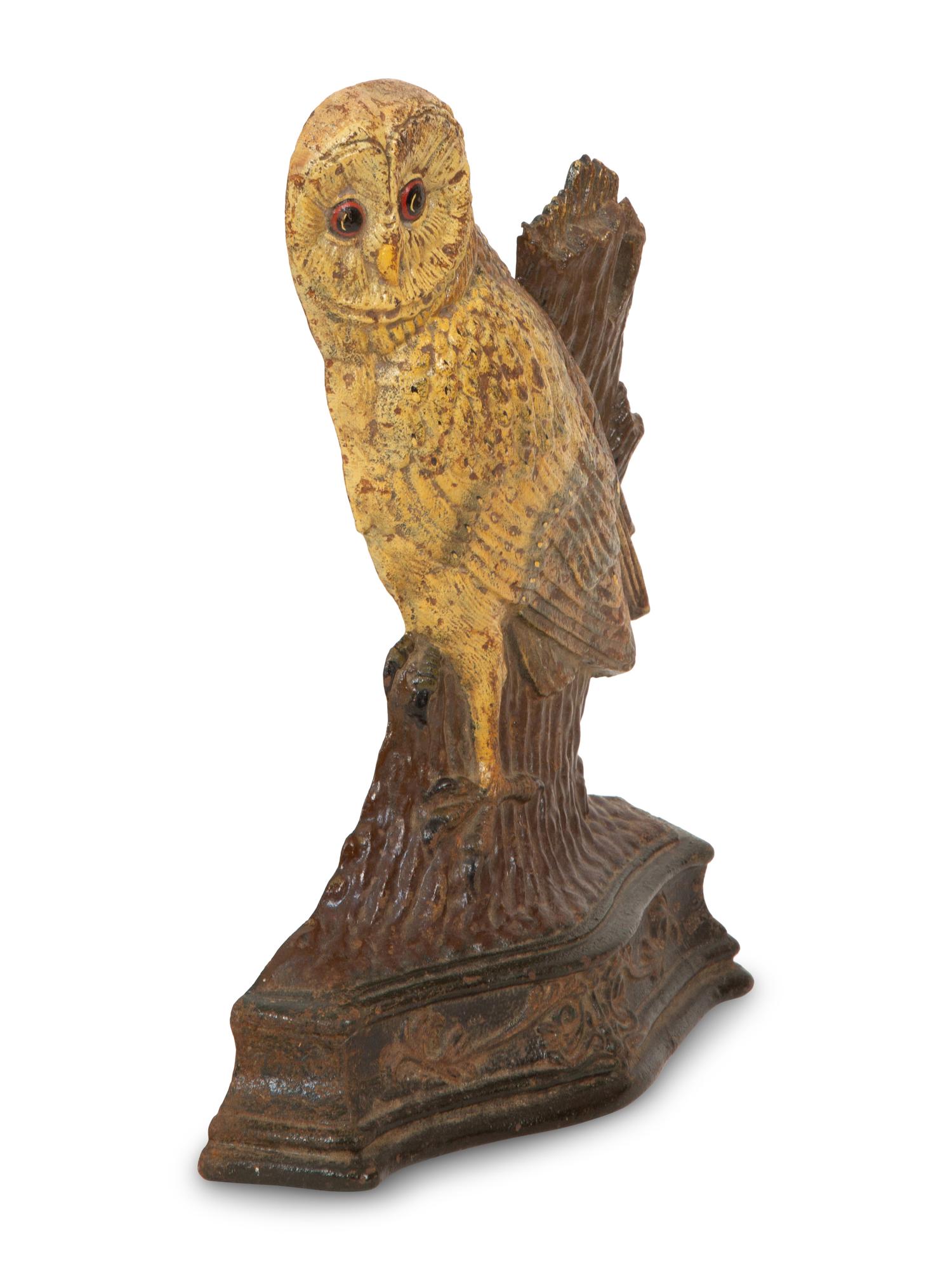 A Painted Cast Iron Owl Doorstop