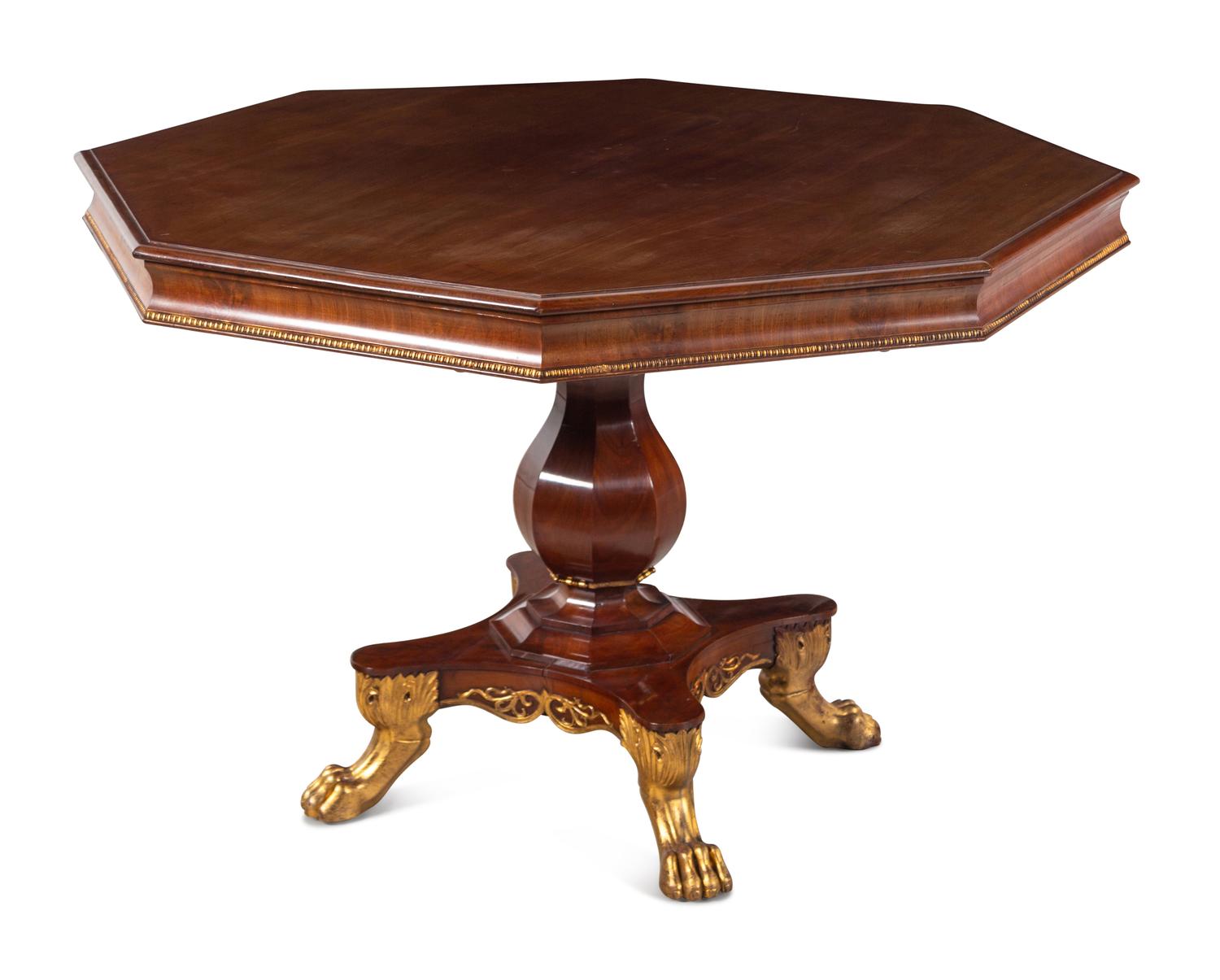 A Regency Parcel-Gilt Walnut Center Table