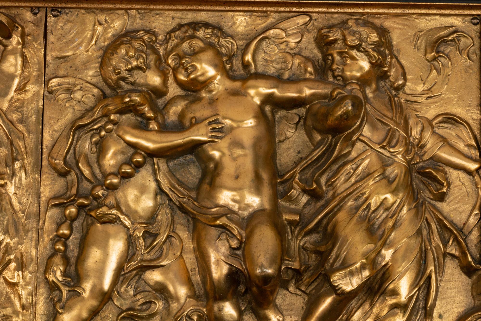 Two Italian Gilt-Bronze Plaques Depicting A Procession of Cupids