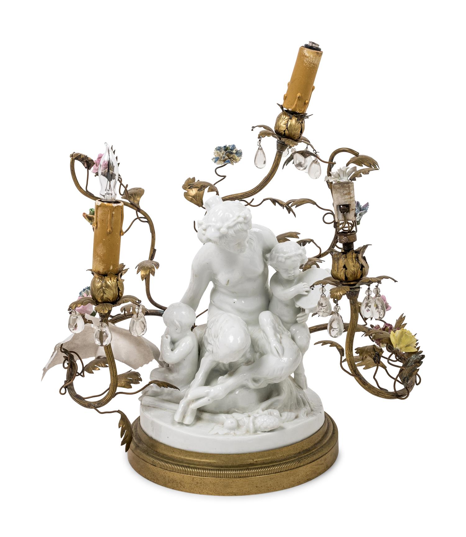 A Gilt Metal Mounted White Glazed Porcelain Figural Group after Clodion Mounted as a Lamp