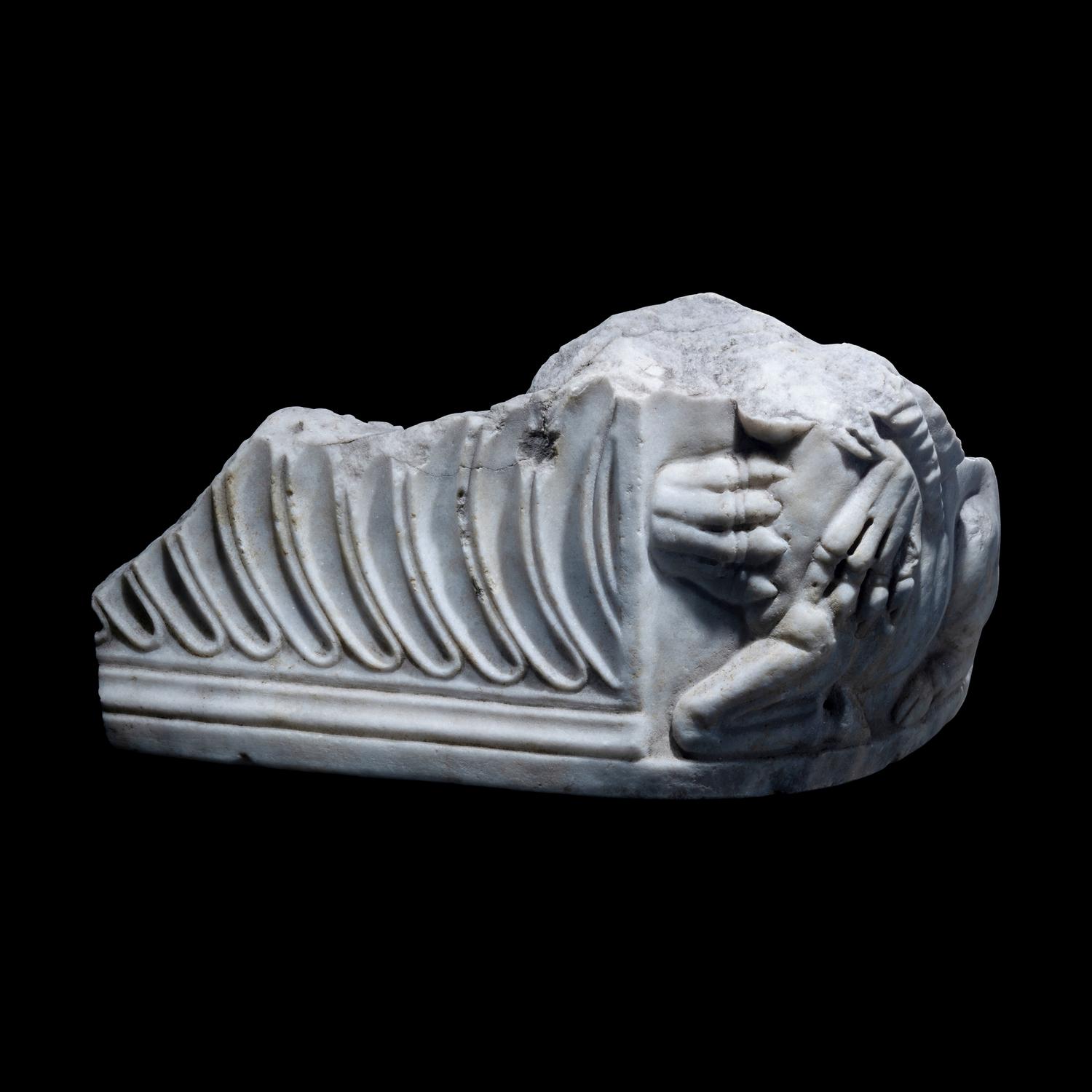 A Roman Marble Sarcophagus Fragment