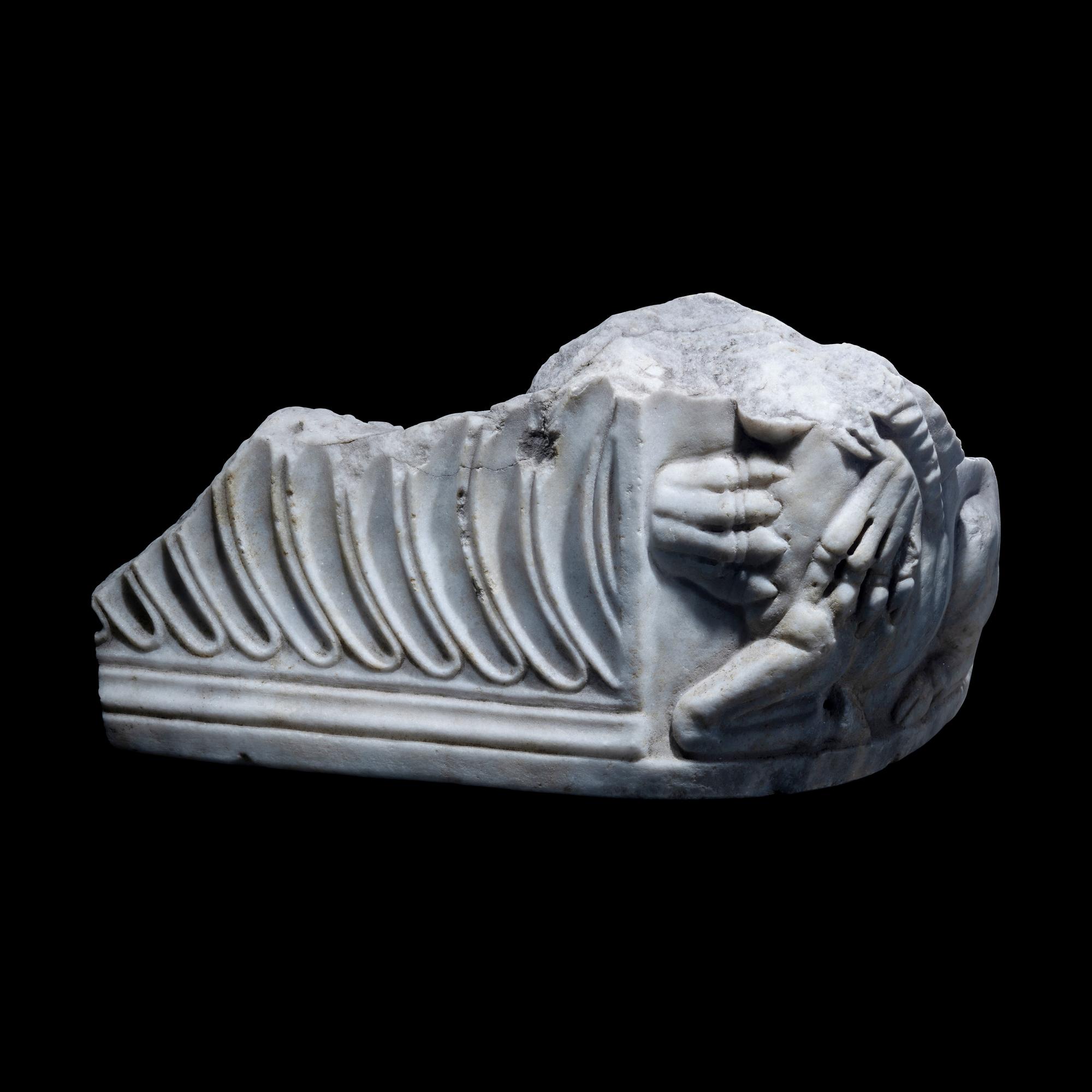 A Roman Marble Sarcophagus Fragment