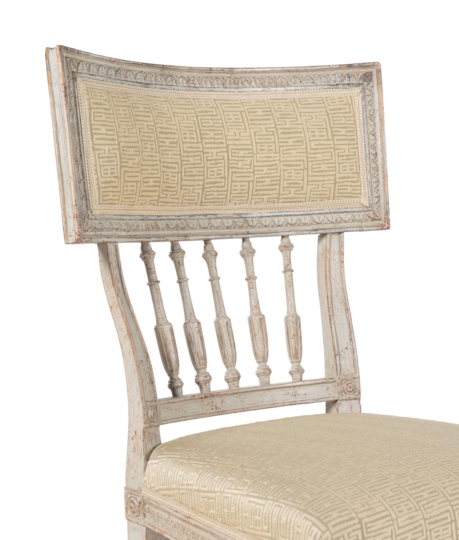 A Pair of Louis XVI White-Painted Side Chairs