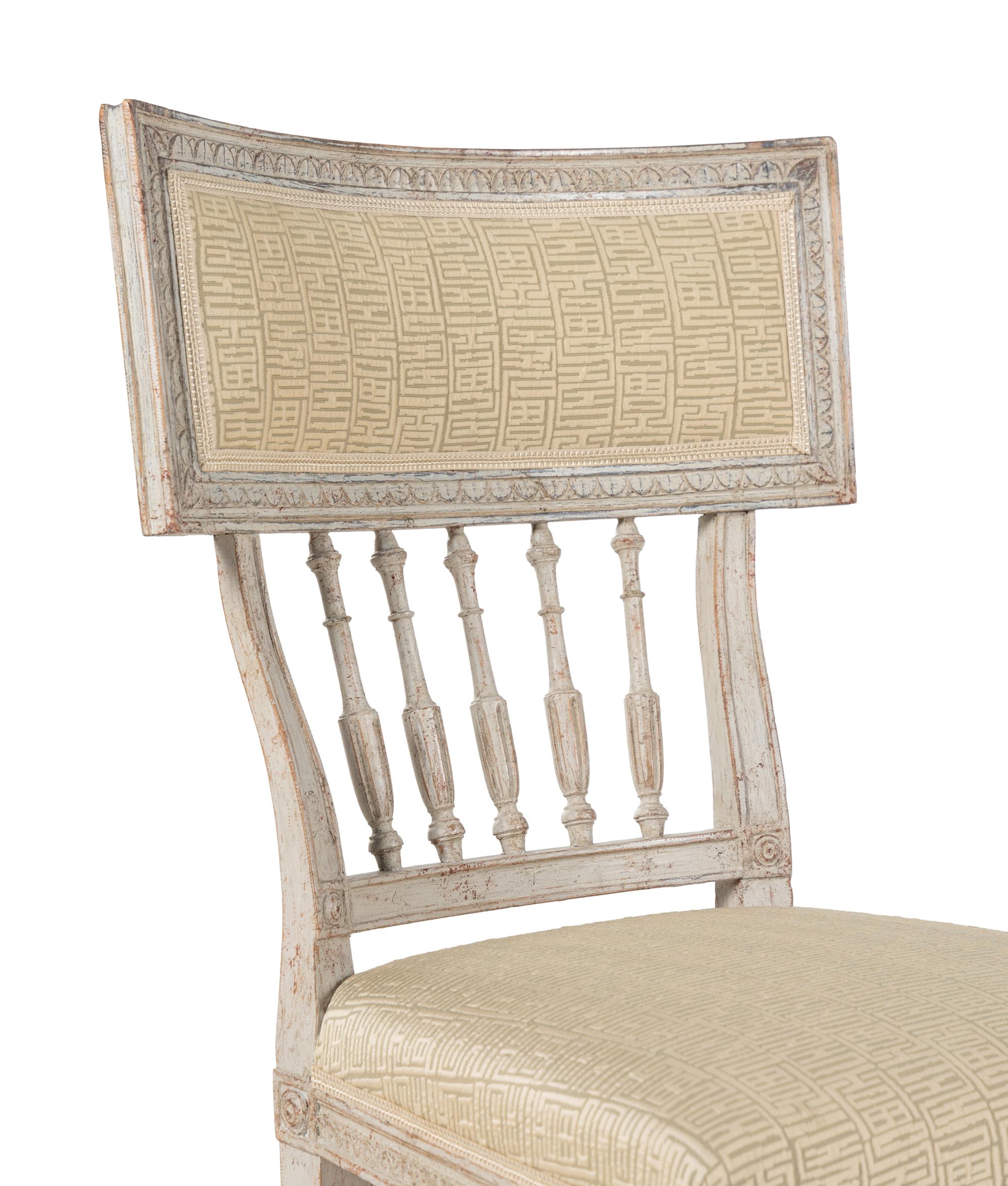 A Pair of Louis XVI White-Painted Side Chairs
