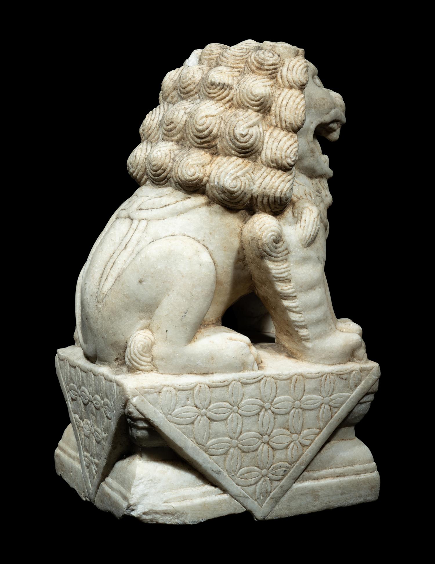 A Chinese Carved White Mable Figure of Fu Lion