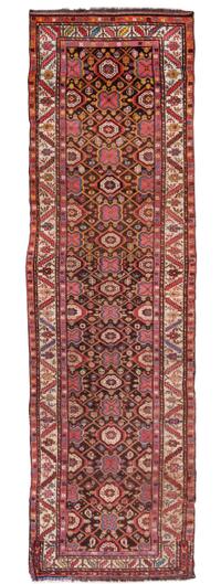 A Kurdish Wool Runner 13 feet 3 inches x 3 feet 5 inches. — EARLY 20TH CENTURY