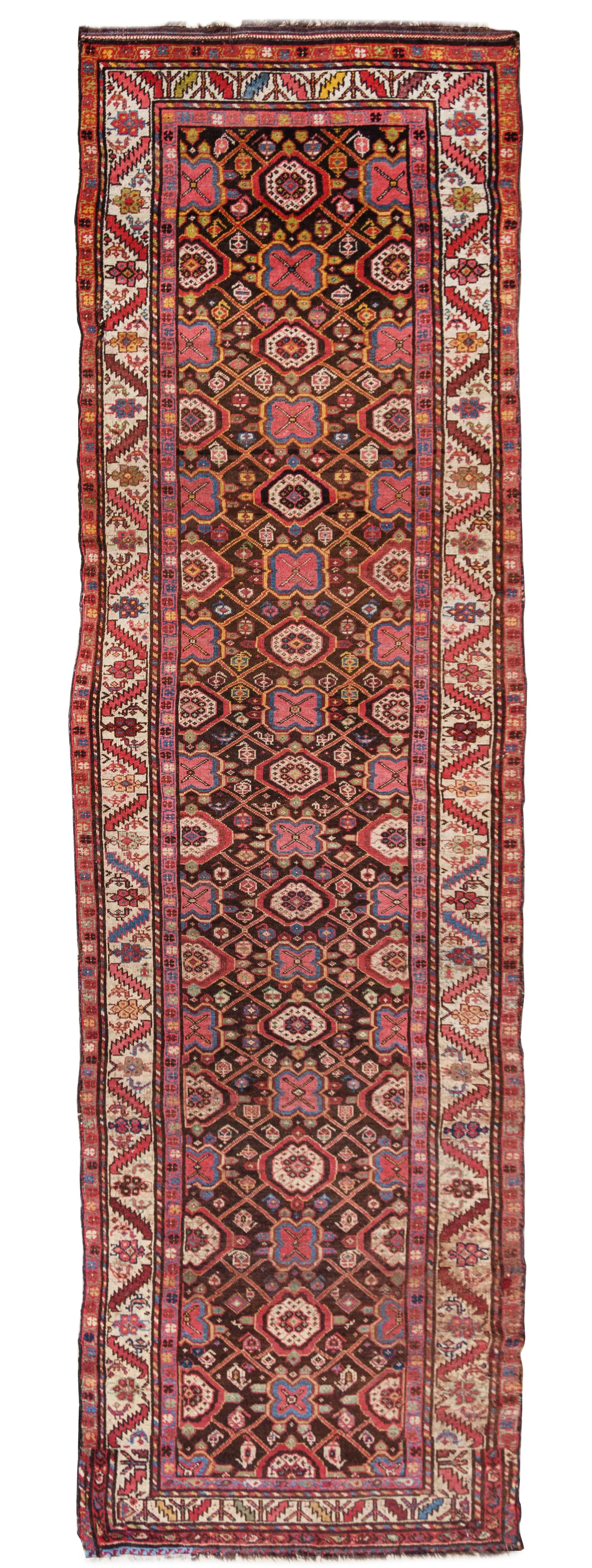 A Kurdish Wool Runner 13 feet 3 inches x 3 feet 5 inches. — EARLY 20TH CENTURY