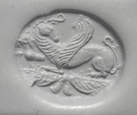 A Greco-Persian Onyx Scaraboid with a Griffin and Winged Sun Disc