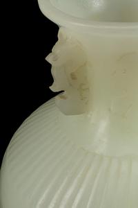 A Pair of Chinese White Peking Glass Covered Vases