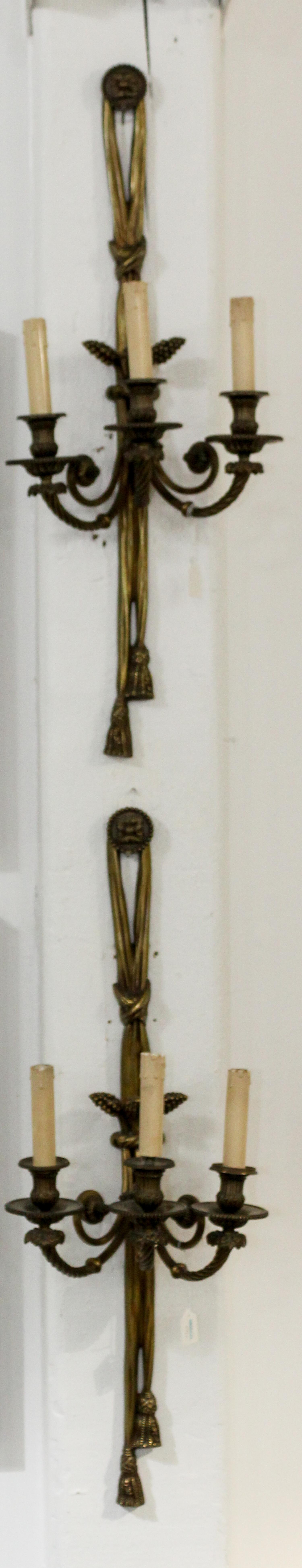 A Pair of Gilt Metal Sconces. Height 35 inches.