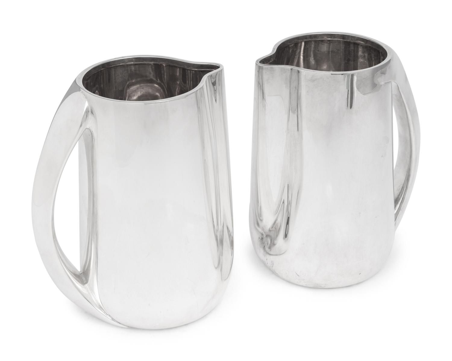 A Pair of Elsa Peretti for Tiffany and Co. Italian Silver Pitchers