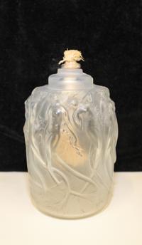 A Rene Lalique Frosted Glass Oil Lamp. Height 5 3/4 inches.