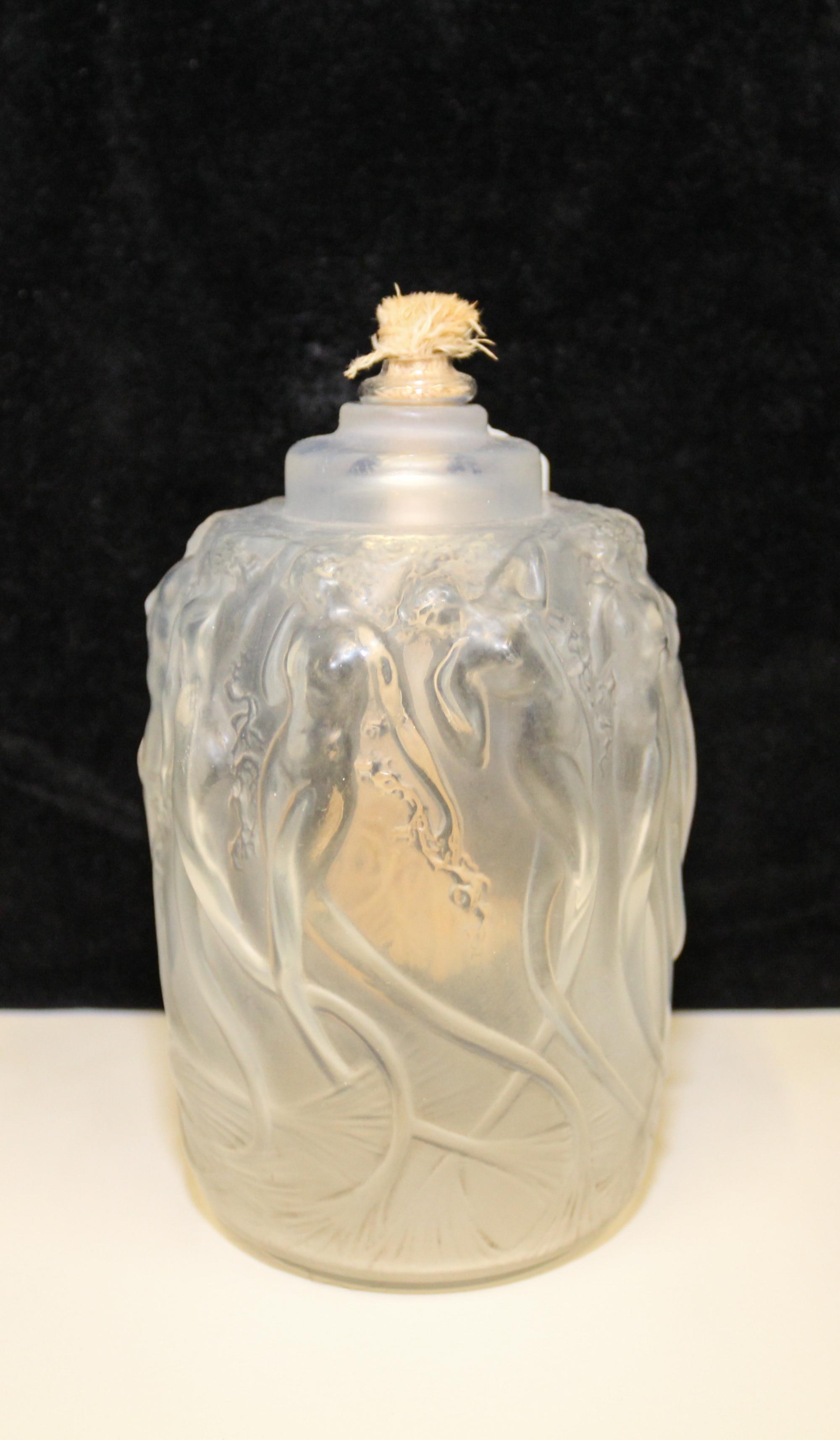 A Rene Lalique Frosted Glass Oil Lamp. Height 5 3/4 inches.