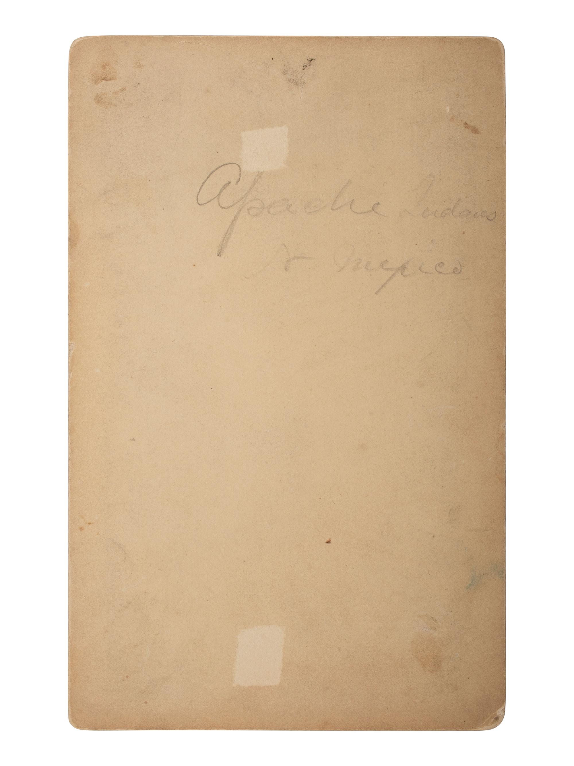 [NATIVE AMERICANS]. Boudoir photograph of Apache subjects, likely at San Carlos Indian Reservation, Arizona.