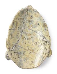 An Olmec Style Carved Stone Mask