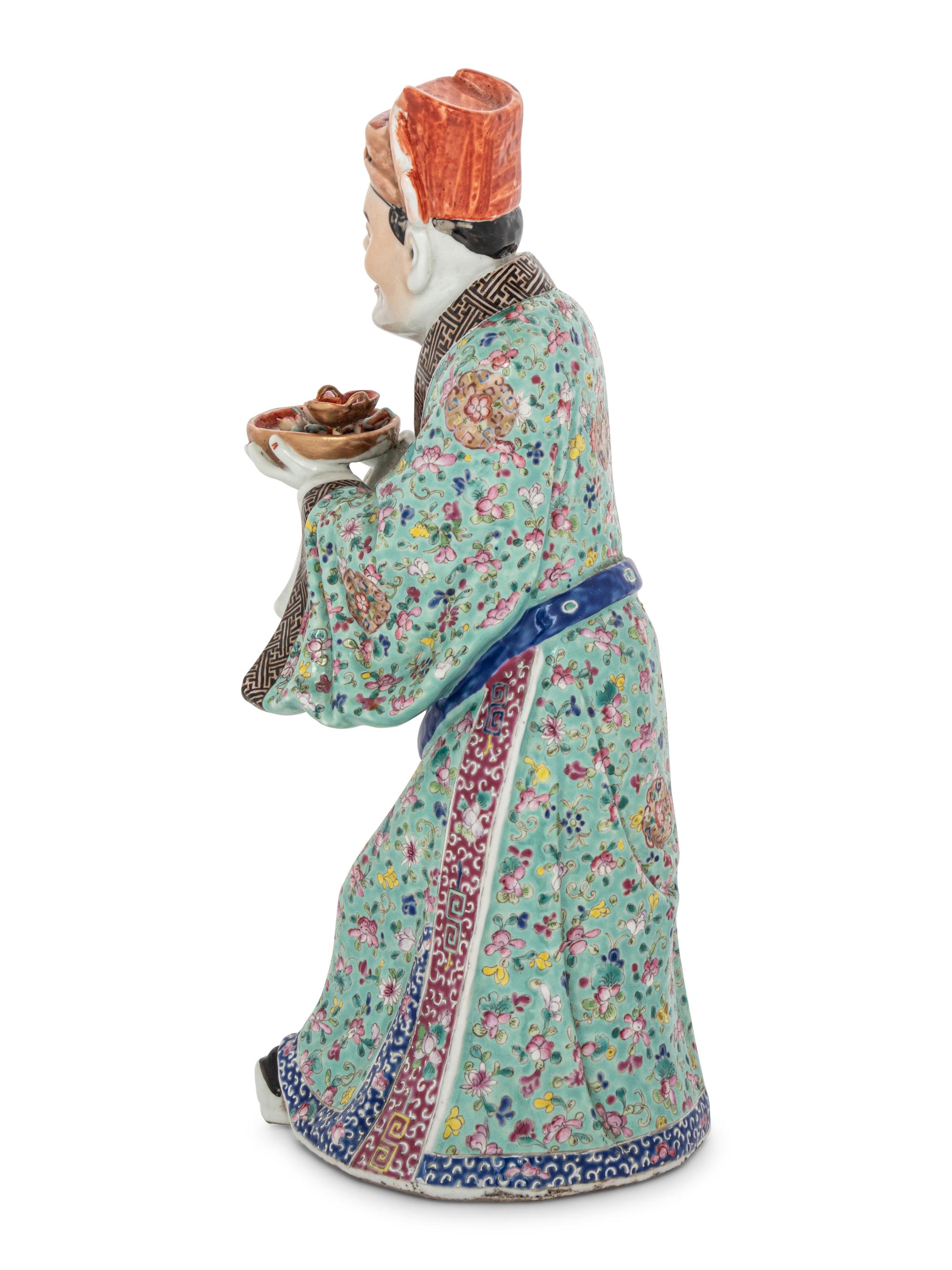 A Chinese Famille Rose Porcelain Figure of a Male